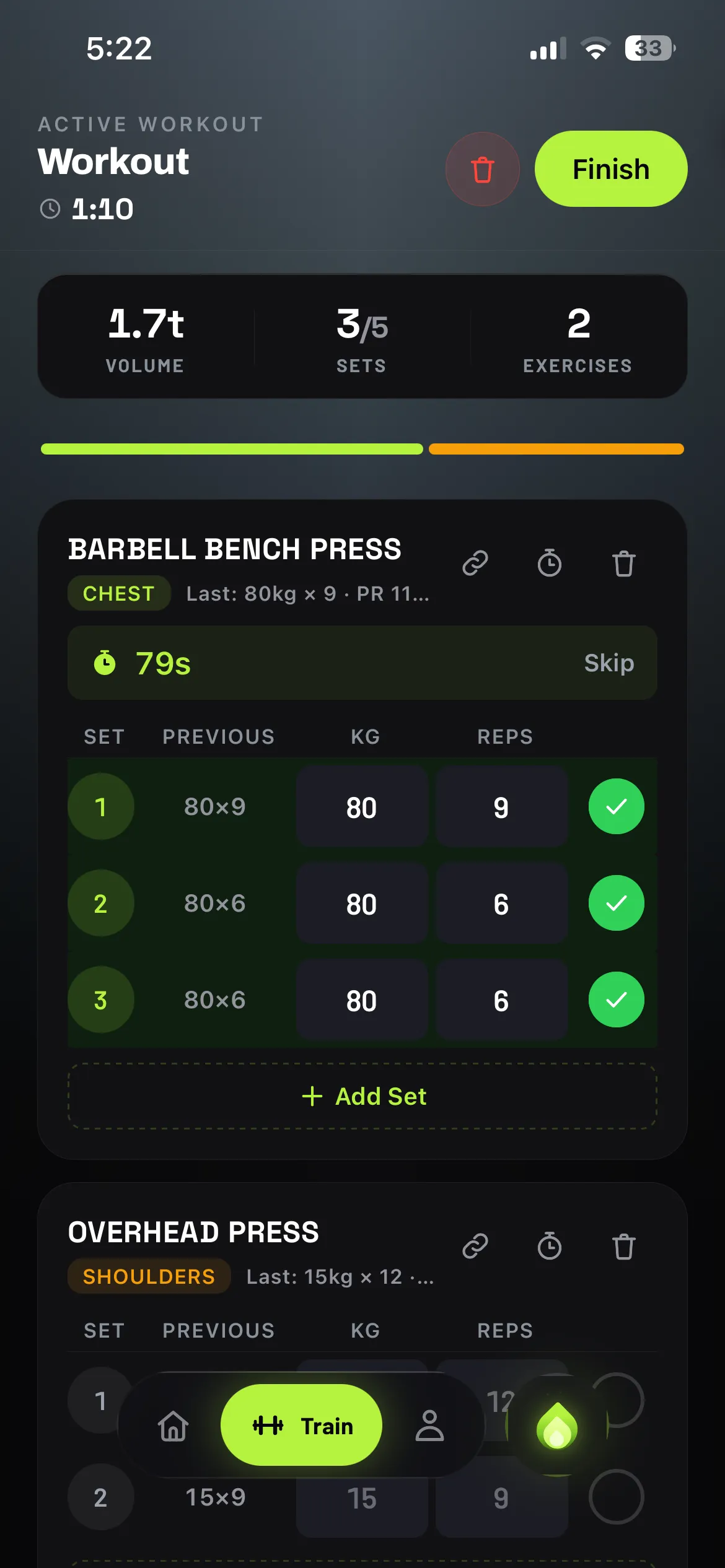 ForgeFit workout logger mid-session: bench press sets logged, rest timer counting down